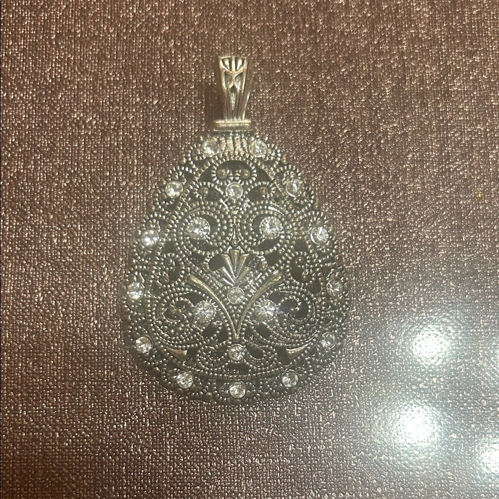 Elegant Silver Filigree Pendant